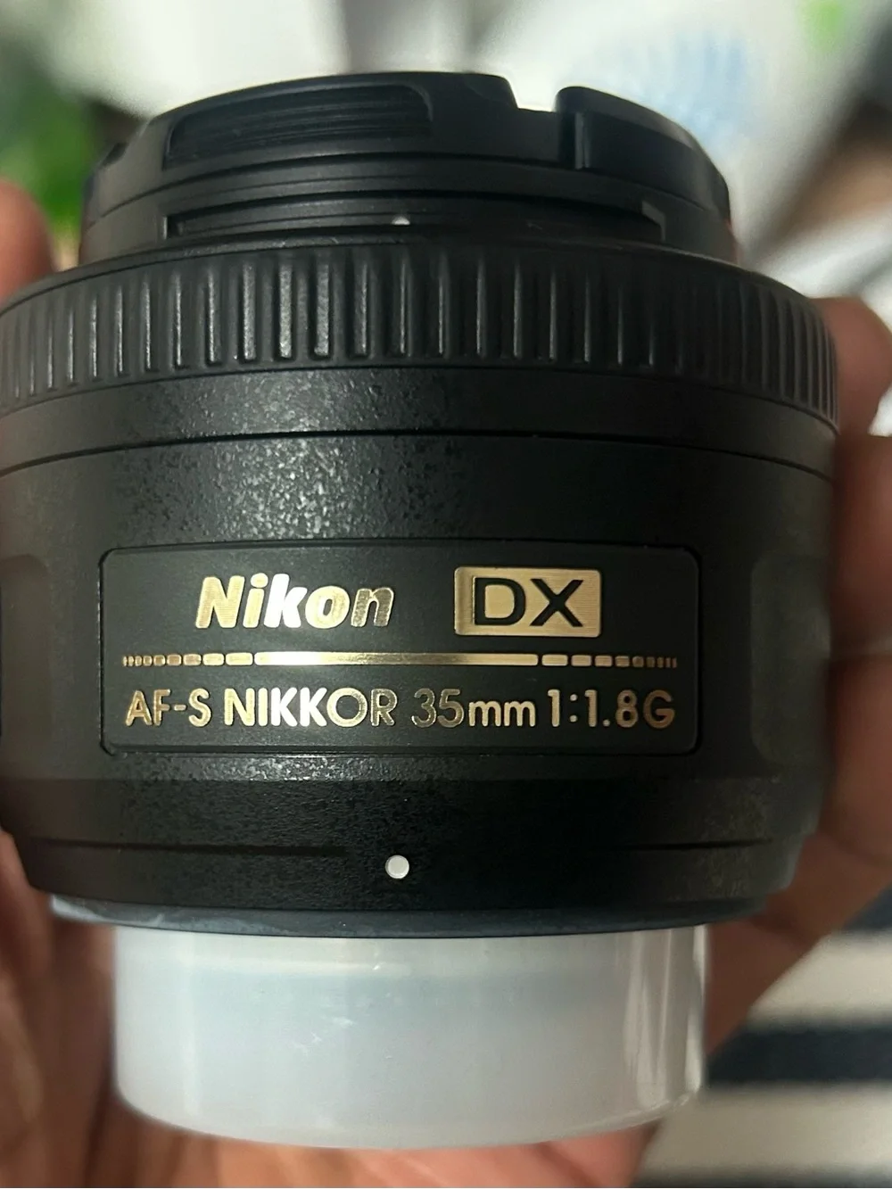 Nikon D3400 Black DSLR with Attached Nikon Lens